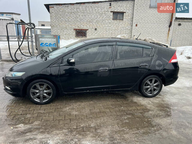 Черный Хонда Инсайт, объемом двигателя 1.34 л и пробегом 213 тыс. км за 6700 $, фото 1 на Automoto.ua