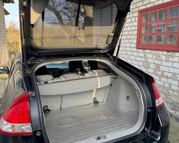 Черный Хонда Инсайт, объемом двигателя 1.34 л и пробегом 177 тыс. км за 9800 $, фото 25 на Automoto.ua