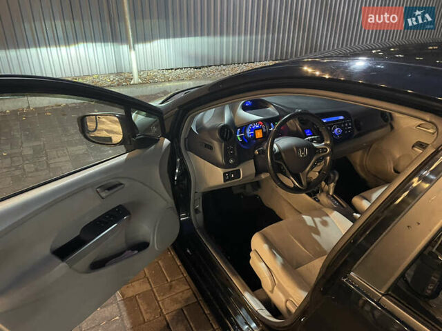 Черный Хонда Инсайт, объемом двигателя 1.34 л и пробегом 216 тыс. км за 6899 $, фото 25 на Automoto.ua