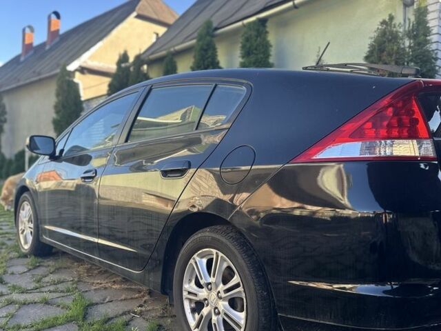 Чорний Хонда Інсайт, об'ємом двигуна 1.3 л та пробігом 160 тис. км за 8000 $, фото 1 на Automoto.ua