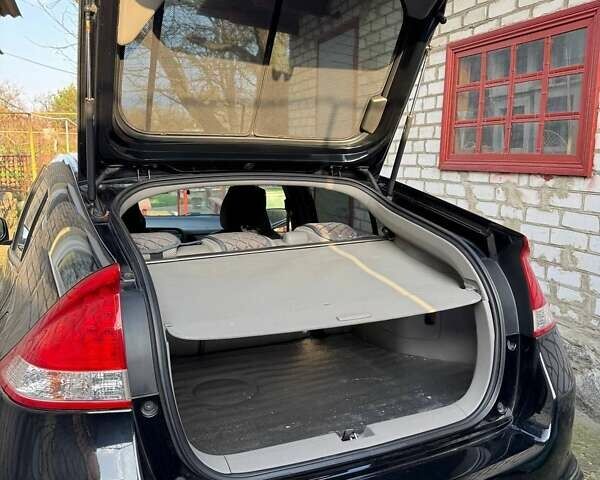 Черный Хонда Инсайт, объемом двигателя 1.34 л и пробегом 177 тыс. км за 9800 $, фото 26 на Automoto.ua