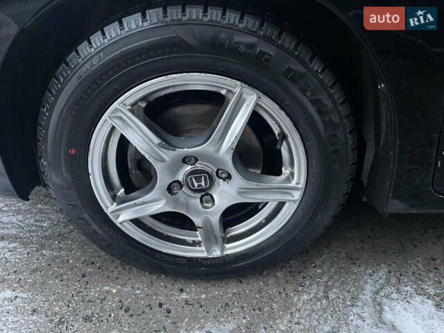 Черный Хонда Инсайт, объемом двигателя 1.34 л и пробегом 216 тыс. км за 6899 $, фото 8 на Automoto.ua
