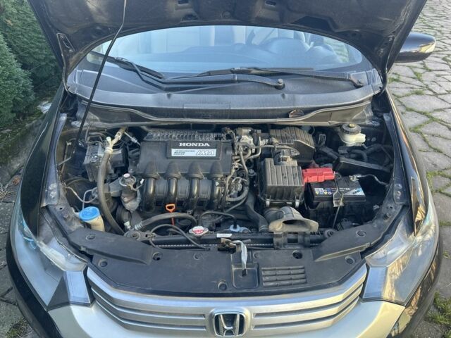 Черный Хонда Инсайт, объемом двигателя 1.3 л и пробегом 160 тыс. км за 7500 $, фото 14 на Automoto.ua