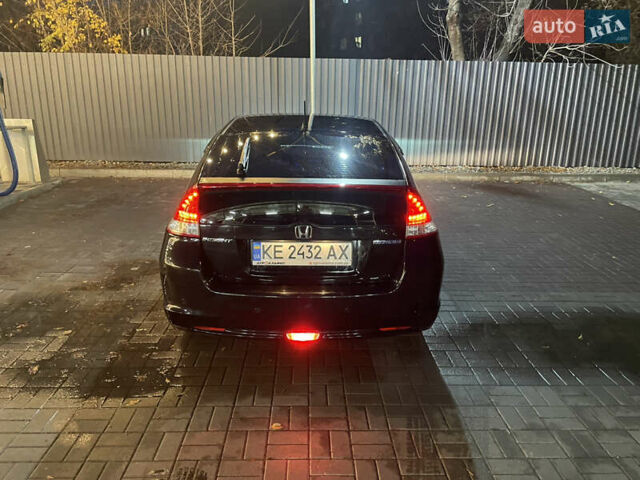 Черный Хонда Инсайт, объемом двигателя 1.34 л и пробегом 216 тыс. км за 6899 $, фото 37 на Automoto.ua