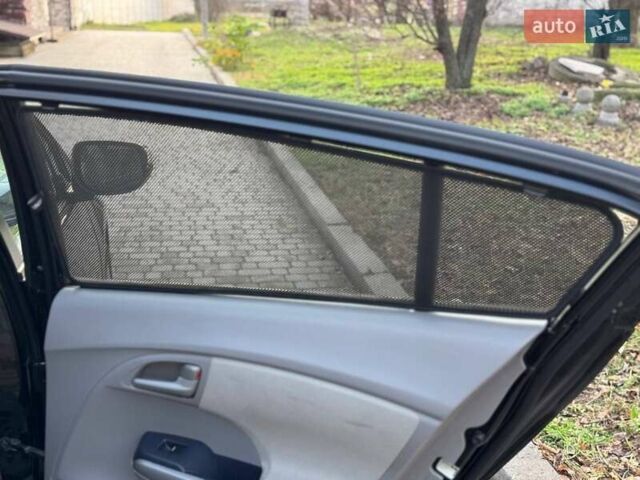 Черный Хонда Инсайт, объемом двигателя 1.34 л и пробегом 177 тыс. км за 9800 $, фото 11 на Automoto.ua