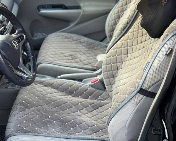 Черный Хонда Инсайт, объемом двигателя 1.34 л и пробегом 177 тыс. км за 9800 $, фото 12 на Automoto.ua