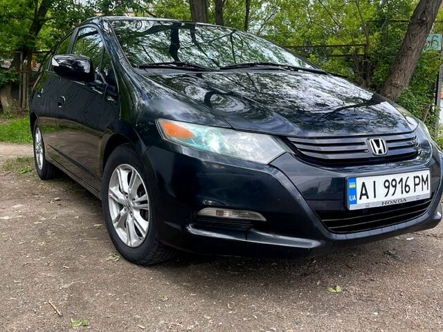 Чорний Хонда Інсайт, об'ємом двигуна 1.3 л та пробігом 210 тис. км за 6500 $, фото 1 на Automoto.ua