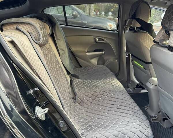 Черный Хонда Инсайт, объемом двигателя 1.34 л и пробегом 177 тыс. км за 9800 $, фото 15 на Automoto.ua