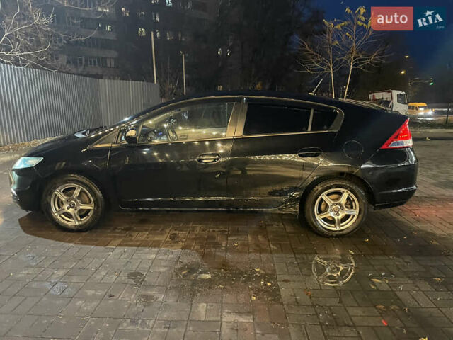 Черный Хонда Инсайт, объемом двигателя 1.34 л и пробегом 216 тыс. км за 6899 $, фото 56 на Automoto.ua