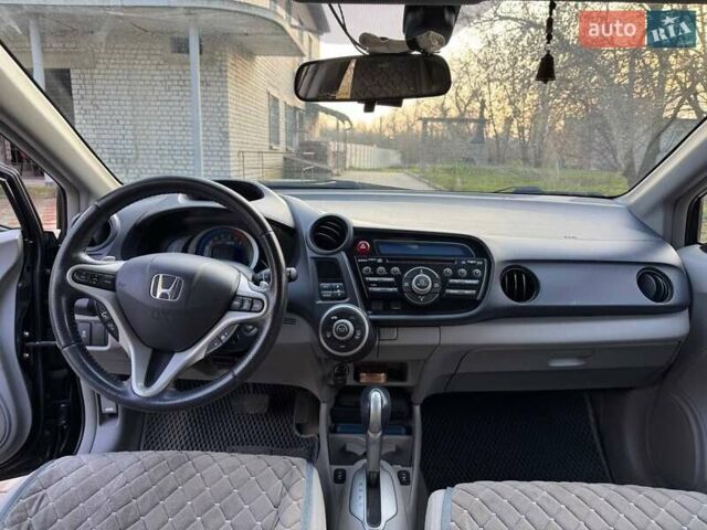 Черный Хонда Инсайт, объемом двигателя 1.34 л и пробегом 177 тыс. км за 9800 $, фото 14 на Automoto.ua