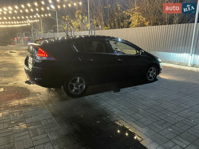 Черный Хонда Инсайт, объемом двигателя 1.34 л и пробегом 216 тыс. км за 6899 $, фото 53 на Automoto.ua