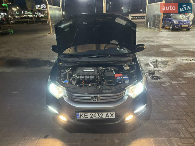 Черный Хонда Инсайт, объемом двигателя 1.34 л и пробегом 216 тыс. км за 6899 $, фото 48 на Automoto.ua