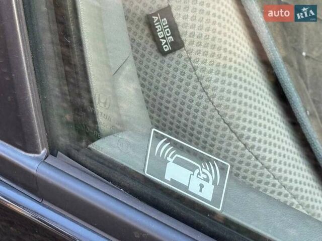 Черный Хонда Инсайт, объемом двигателя 1.34 л и пробегом 177 тыс. км за 9800 $, фото 9 на Automoto.ua