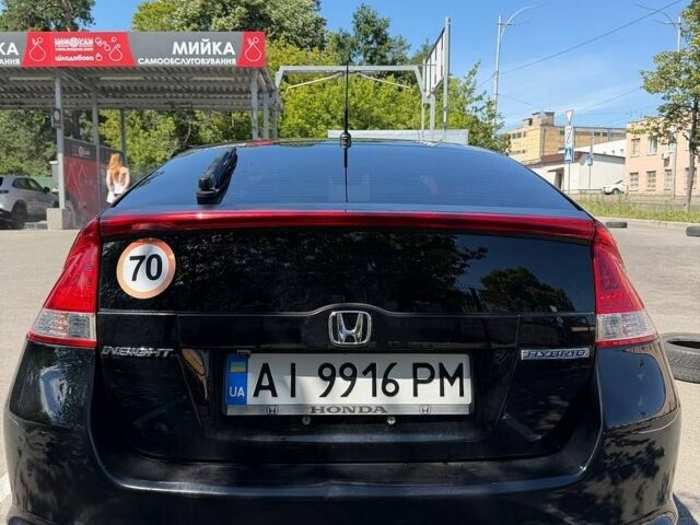 Черный Хонда Инсайт, объемом двигателя 1.34 л и пробегом 205 тыс. км за 5950 $, фото 4 на Automoto.ua