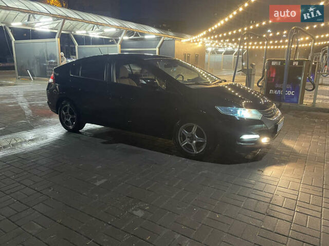 Черный Хонда Инсайт, объемом двигателя 1.34 л и пробегом 216 тыс. км за 6899 $, фото 52 на Automoto.ua