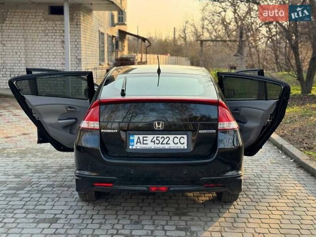 Черный Хонда Инсайт, объемом двигателя 1.34 л и пробегом 177 тыс. км за 9800 $, фото 4 на Automoto.ua