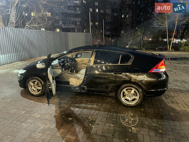 Черный Хонда Инсайт, объемом двигателя 1.34 л и пробегом 216 тыс. км за 6899 $, фото 24 на Automoto.ua