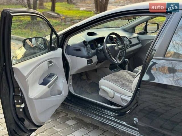 Черный Хонда Инсайт, объемом двигателя 1.34 л и пробегом 177 тыс. км за 9800 $, фото 18 на Automoto.ua