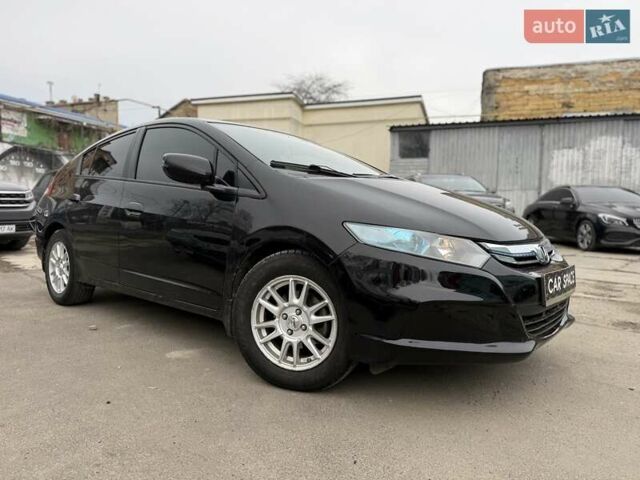 Черный Хонда Инсайт, объемом двигателя 1.3 л и пробегом 155 тыс. км за 7750 $, фото 5 на Automoto.ua