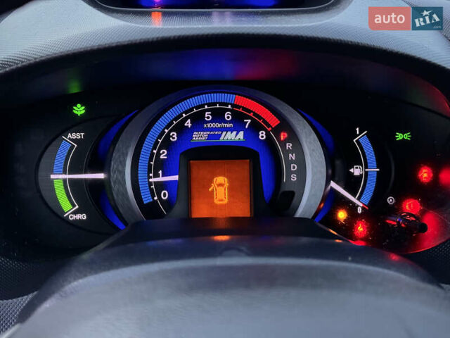 Коричневий Хонда Інсайт, об'ємом двигуна 1.3 л та пробігом 169 тис. км за 7700 $, фото 32 на Automoto.ua