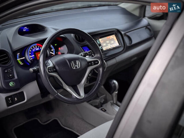 Коричневий Хонда Інсайт, об'ємом двигуна 1.3 л та пробігом 169 тис. км за 7700 $, фото 25 на Automoto.ua
