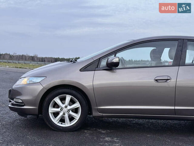 Коричневий Хонда Інсайт, об'ємом двигуна 1.3 л та пробігом 169 тис. км за 7700 $, фото 5 на Automoto.ua