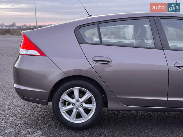 Коричневий Хонда Інсайт, об'ємом двигуна 1.3 л та пробігом 169 тис. км за 7700 $, фото 16 на Automoto.ua