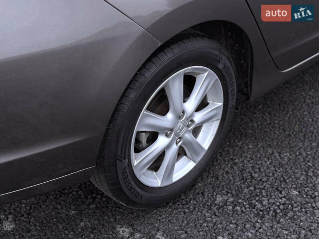 Коричневий Хонда Інсайт, об'ємом двигуна 1.3 л та пробігом 169 тис. км за 7700 $, фото 14 на Automoto.ua