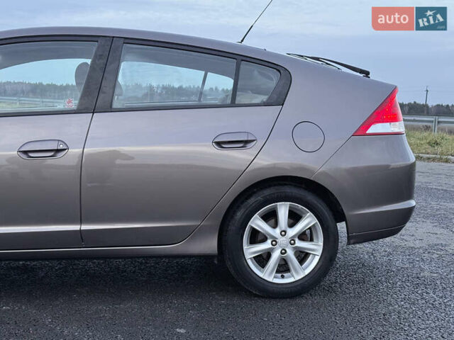 Коричневий Хонда Інсайт, об'ємом двигуна 1.3 л та пробігом 169 тис. км за 7700 $, фото 6 на Automoto.ua