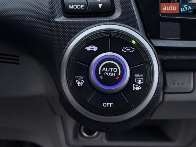 Коричневий Хонда Інсайт, об'ємом двигуна 1.3 л та пробігом 169 тис. км за 7700 $, фото 36 на Automoto.ua