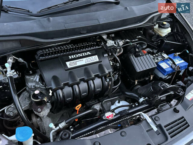Коричневий Хонда Інсайт, об'ємом двигуна 1.3 л та пробігом 169 тис. км за 7700 $, фото 54 на Automoto.ua