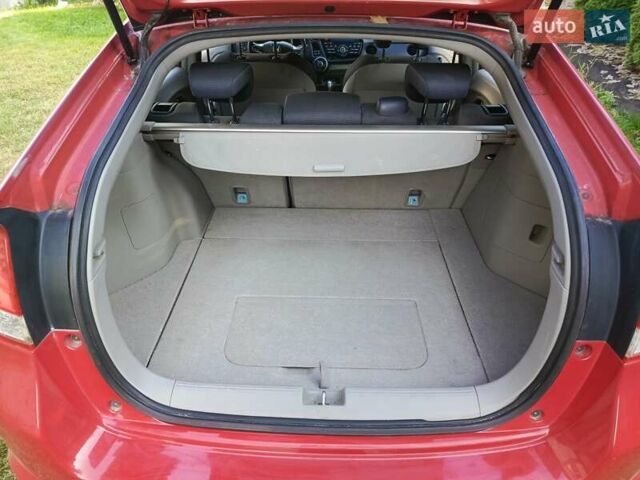 Красный Хонда Инсайт, объемом двигателя 1.3 л и пробегом 247 тыс. км за 5700 $, фото 20 на Automoto.ua