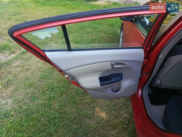 Красный Хонда Инсайт, объемом двигателя 1.3 л и пробегом 247 тыс. км за 6800 $, фото 10 на Automoto.ua