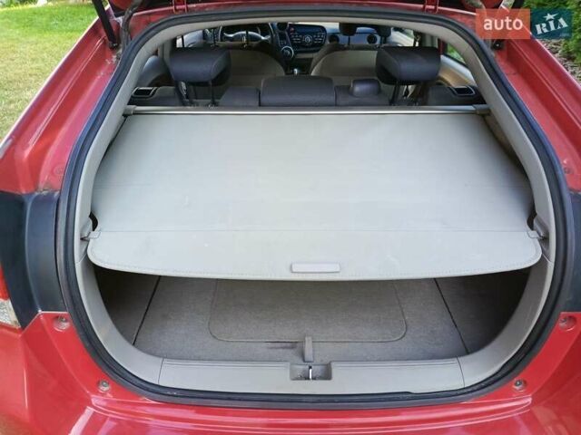 Красный Хонда Инсайт, объемом двигателя 1.3 л и пробегом 247 тыс. км за 5700 $, фото 22 на Automoto.ua
