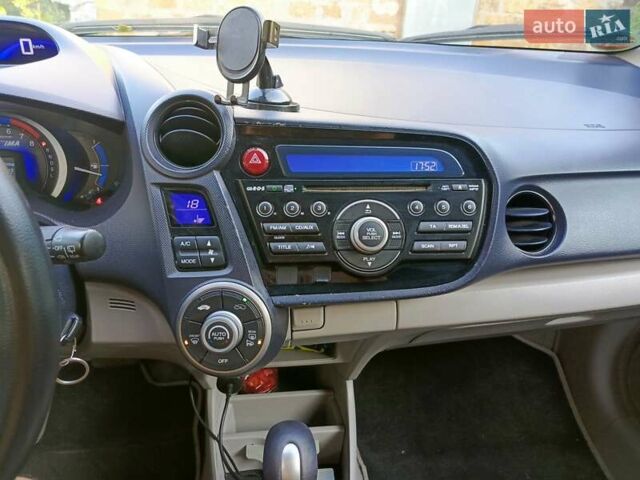 Красный Хонда Инсайт, объемом двигателя 1.3 л и пробегом 247 тыс. км за 5700 $, фото 19 на Automoto.ua