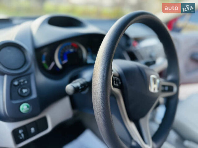 Червоний Хонда Інсайт, об'ємом двигуна 1.3 л та пробігом 37 тис. км за 8550 $, фото 48 на Automoto.ua