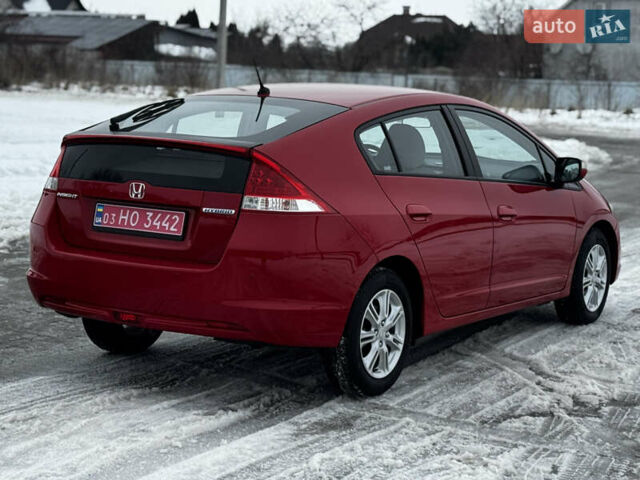 Красный Хонда Инсайт, объемом двигателя 1.3 л и пробегом 38 тыс. км за 8200 $, фото 6 на Automoto.ua