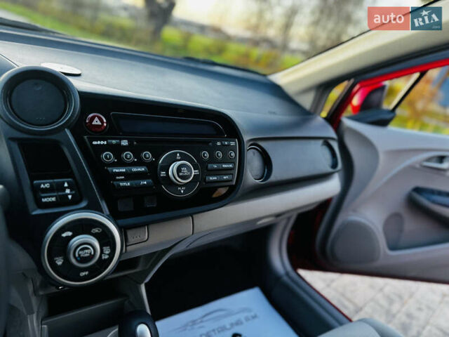 Червоний Хонда Інсайт, об'ємом двигуна 1.3 л та пробігом 37 тис. км за 8550 $, фото 53 на Automoto.ua