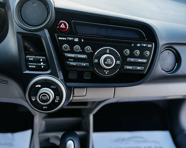 Червоний Хонда Інсайт, об'ємом двигуна 1.3 л та пробігом 37 тис. км за 8550 $, фото 51 на Automoto.ua