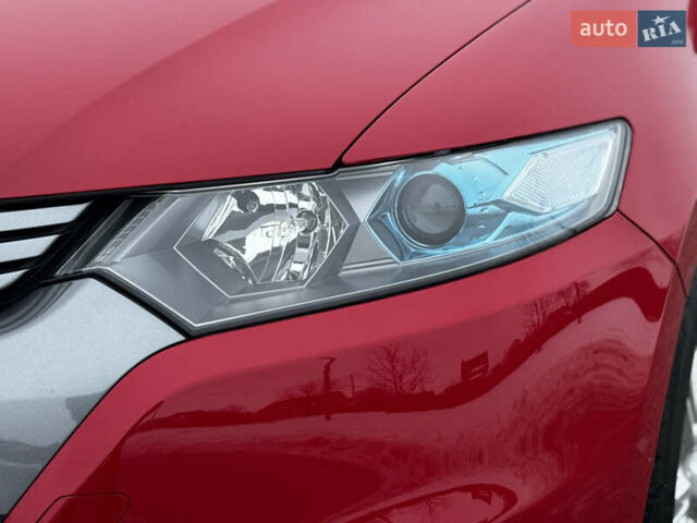 Красный Хонда Инсайт, объемом двигателя 1.3 л и пробегом 38 тыс. км за 8200 $, фото 11 на Automoto.ua