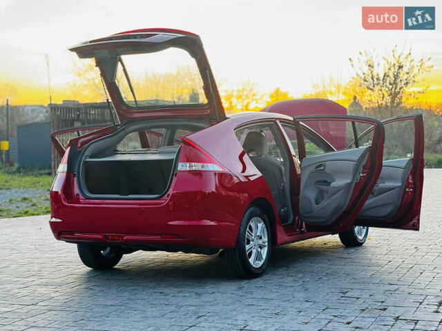 Красный Хонда Инсайт, объемом двигателя 1.3 л и пробегом 37 тыс. км за 8499 $, фото 61 на Automoto.ua