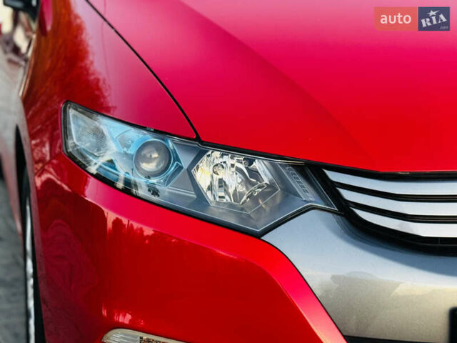 Червоний Хонда Інсайт, об'ємом двигуна 1.3 л та пробігом 37 тис. км за 8550 $, фото 21 на Automoto.ua