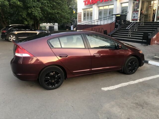 Червоний Хонда Інсайт, об'ємом двигуна 1.3 л та пробігом 208 тис. км за 4300 $, фото 1 на Automoto.ua