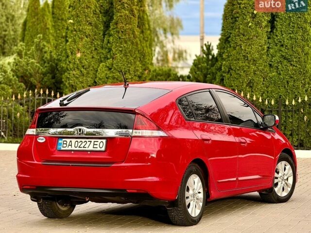 Червоний Хонда Інсайт, об'ємом двигуна 1.4 л та пробігом 209 тис. км за 8600 $, фото 6 на Automoto.ua