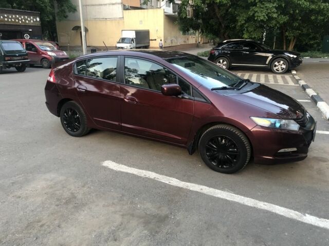 Красный Хонда Инсайт, объемом двигателя 1.3 л и пробегом 208 тыс. км за 4300 $, фото 2 на Automoto.ua