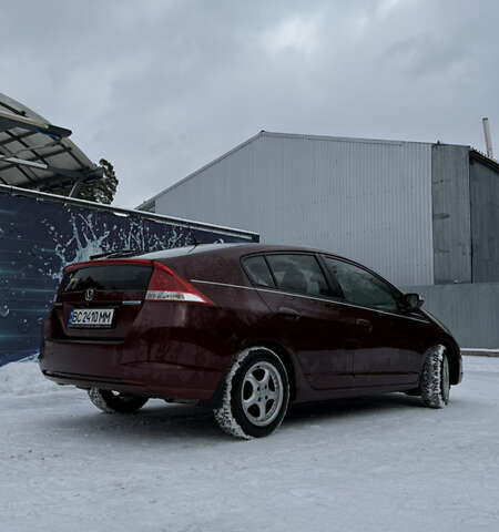 Красный Хонда Инсайт, объемом двигателя 1.34 л и пробегом 229 тыс. км за 6900 $, фото 6 на Automoto.ua