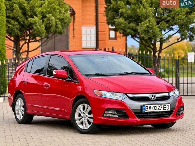 Червоний Хонда Інсайт, об'ємом двигуна 1.4 л та пробігом 209 тис. км за 8600 $, фото 9 на Automoto.ua
