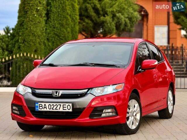 Червоний Хонда Інсайт, об'ємом двигуна 1.4 л та пробігом 209 тис. км за 8600 $, фото 1 на Automoto.ua