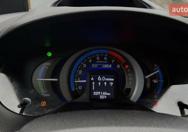 Красный Хонда Инсайт, объемом двигателя 1.34 л и пробегом 229 тыс. км за 6900 $, фото 7 на Automoto.ua