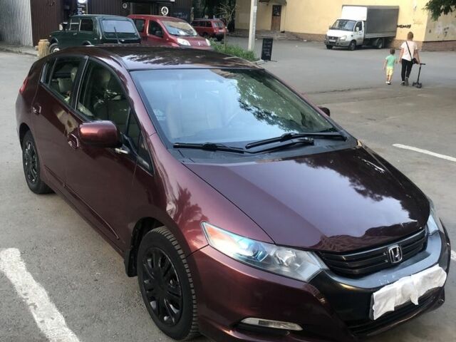 Красный Хонда Инсайт, объемом двигателя 1.3 л и пробегом 208 тыс. км за 4300 $, фото 6 на Automoto.ua